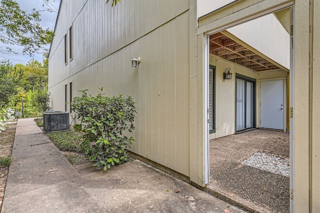 view of home's exterior with central AC unit