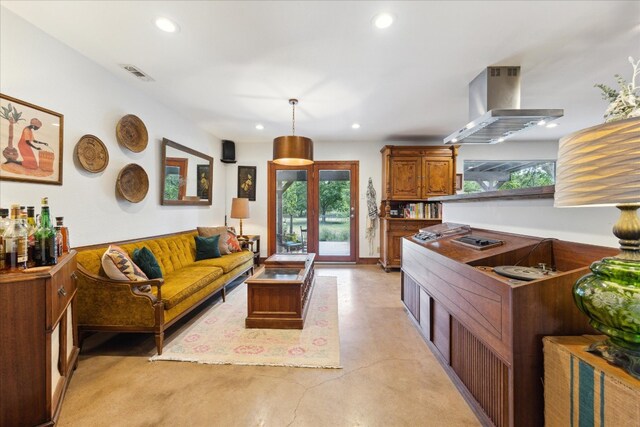 living room featuring a wealth of natural light