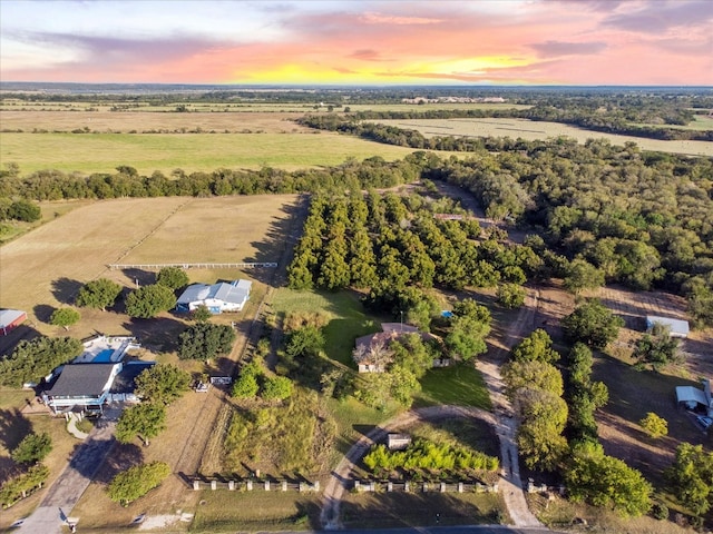 aerial view at dusk with a rural view