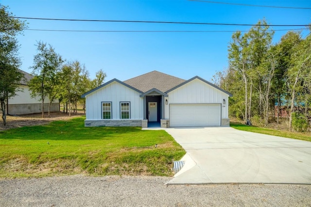 single story home with a garage and a front yard