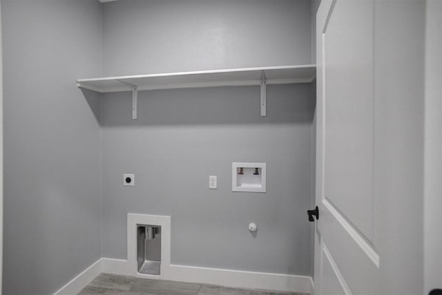 washroom featuring hookup for a gas dryer, washer hookup, and hookup for an electric dryer