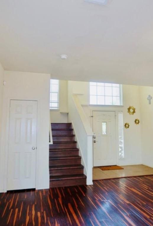 248 Coal Dr, Jarrell, TX 76537 - foyer entrance featuring stairs and wood finished floors