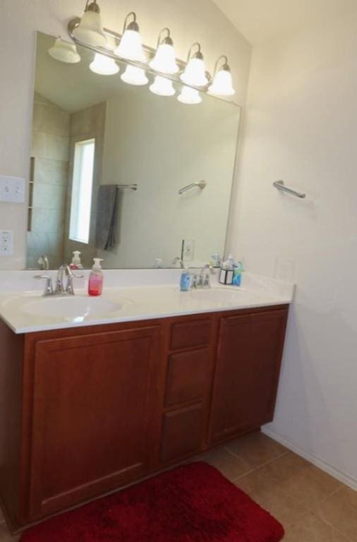 248 Coal Dr, Jarrell, TX 76537 - full bath with double vanity and tile patterned flooring