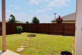 248 Coal Dr, Jarrell, TX 76537 - view of yard with a fenced backyard