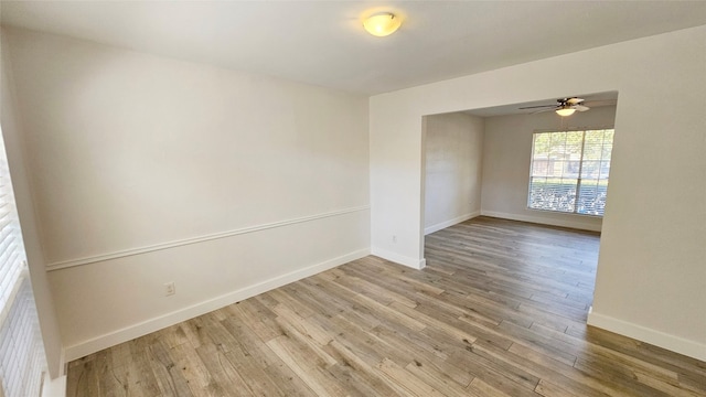 empty room featuring light hardwood / wood-style floors and ceiling fan