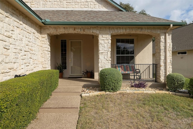 property entrance with a yard