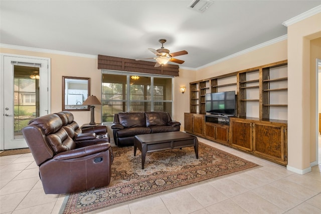 living room featuring ceiling fan, crown molding, and light tile patterned floors