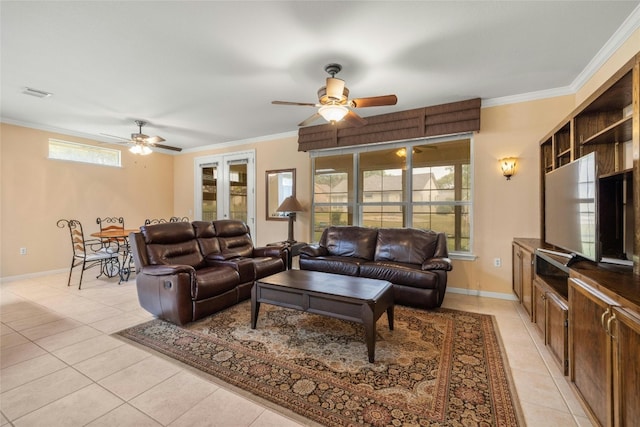 living room with crown molding, light tile patterned flooring, and ceiling fan