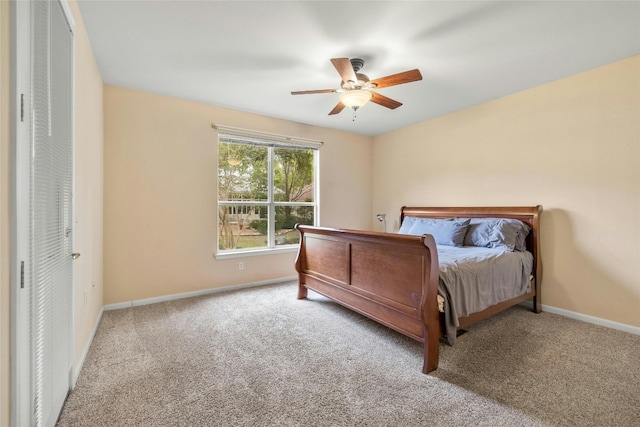 bedroom featuring a closet, ceiling fan, and carpet