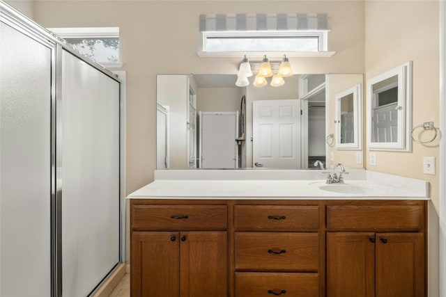 bathroom featuring vanity and walk in shower