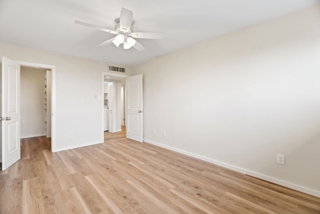 unfurnished bedroom featuring light wood-type flooring and ceiling fan