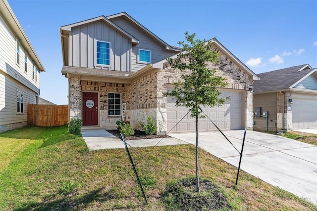 11104 Roving Pass, Elgin, TX 78621 - traditional home with board and batten siding, driveway, fence, an attached garage, and a front yard