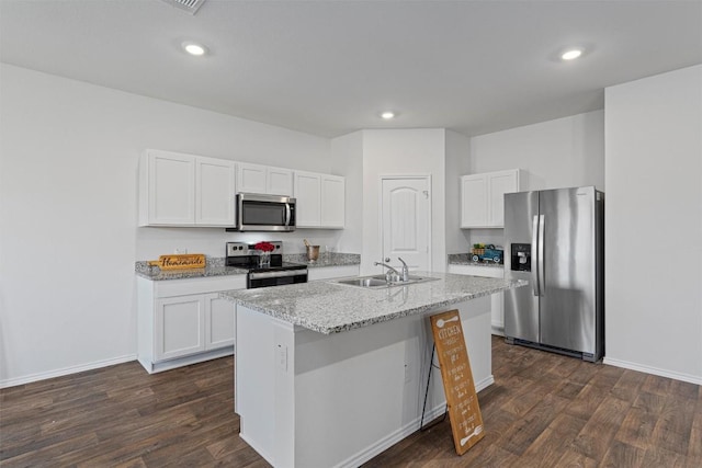 11104 Roving Pass, Elgin, TX 78621 - kitchen featuring white cabinetry, dark wood-style floors, appliances with stainless steel finishes, and a sink