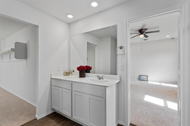 11104 Roving Pass, Elgin, TX 78621 - bathroom featuring baseboards, recessed lighting, vanity, and ceiling fan