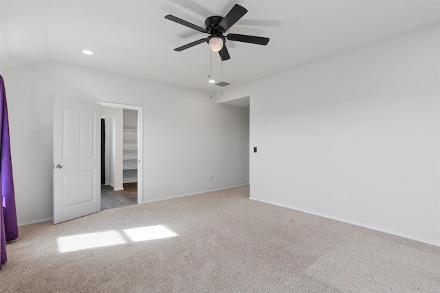11104 Roving Pass, Elgin, TX 78621 - unfurnished bedroom featuring recessed lighting, baseboards, a spacious closet, and carpet floors
