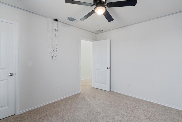 11104 Roving Pass, Elgin, TX 78621 - unfurnished bedroom featuring a ceiling fan, light carpet, baseboards, and visible vents