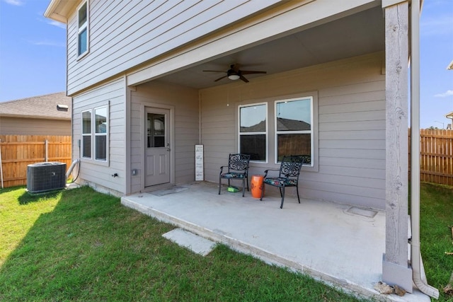 11104 Roving Pass, Elgin, TX 78621 - back of house featuring cooling unit, fence, ceiling fan, a yard, and a patio area