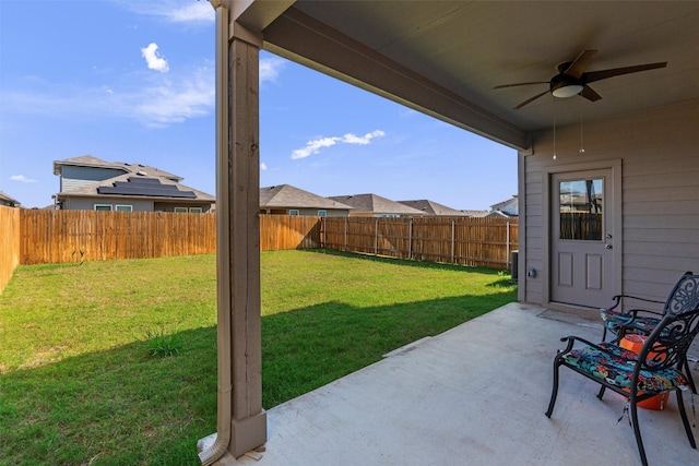 view of patio / terrace featuring ceiling fan