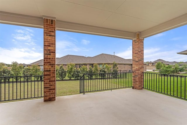 view of patio / terrace featuring fence