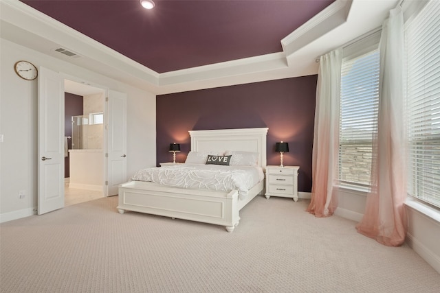 carpeted bedroom with connected bathroom