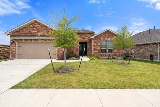 single story home with a garage and a front yard