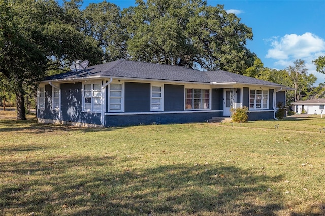 single story home featuring a front yard