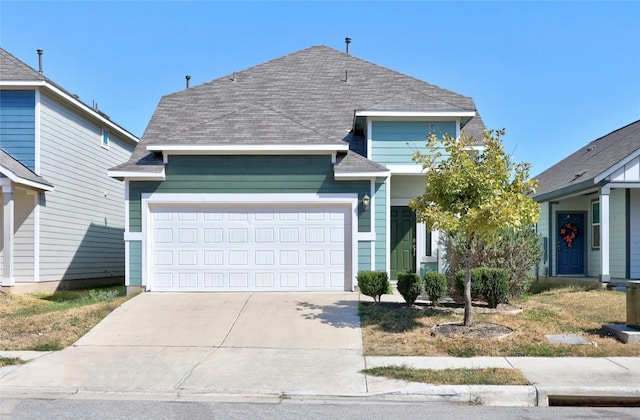 view of front property with a garage