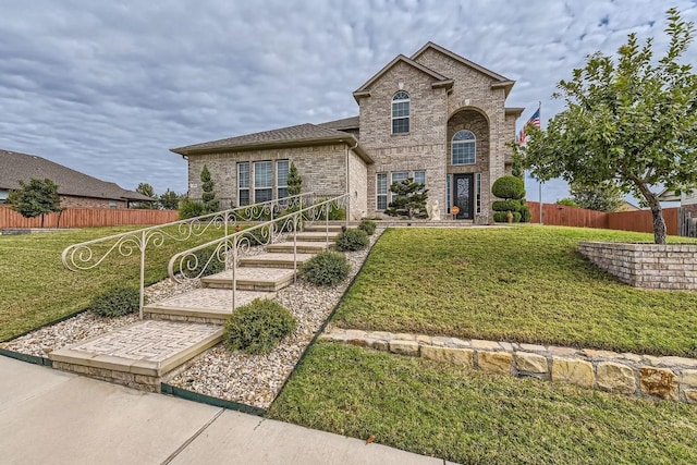 view of front of home featuring a front lawn