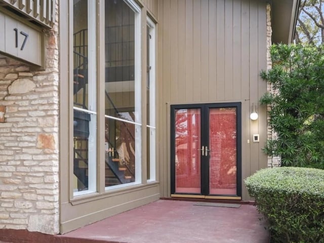 property entrance featuring french doors