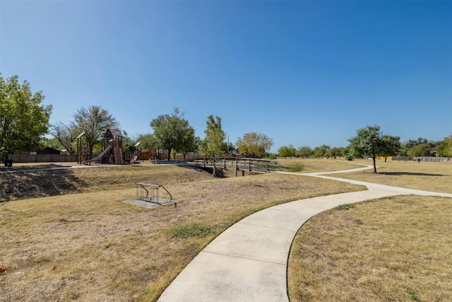 surrounding community featuring a lawn