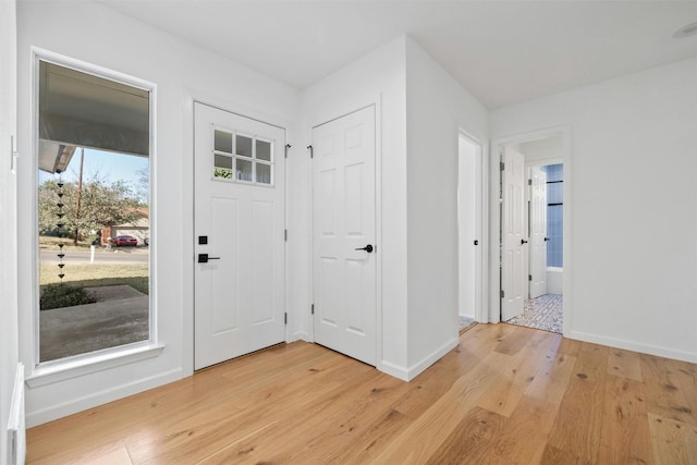 foyer with light hardwood / wood-style flooring