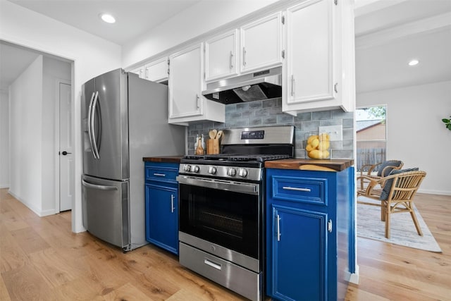 kitchen featuring blue cabinets, white cabinetry, stainless steel appliances, decorative backsplash, and light hardwood / wood-style flooring