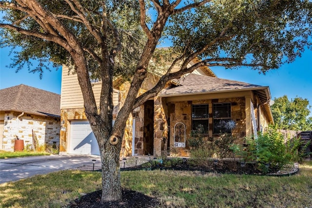 view of front of property with a garage