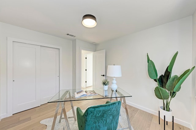 home office featuring light wood-type flooring