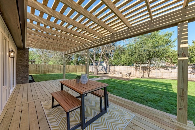 wooden deck featuring a pergola and a yard