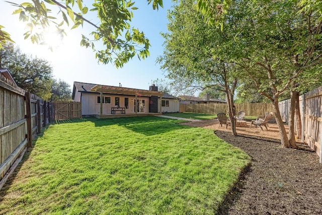 view of yard with a patio area