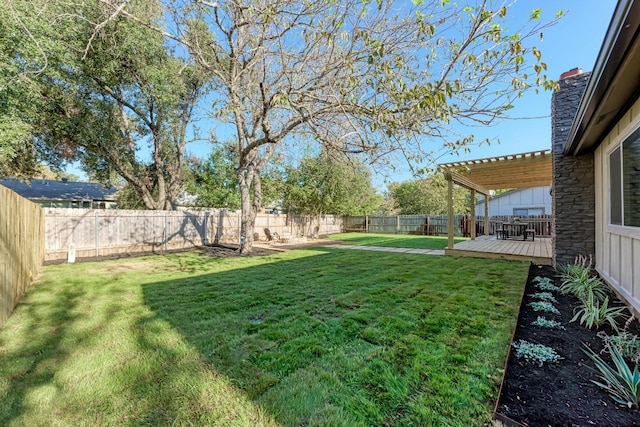 view of yard featuring a pergola and a wooden deck