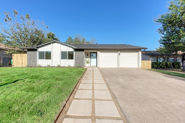 ranch-style house with a garage and a front yard