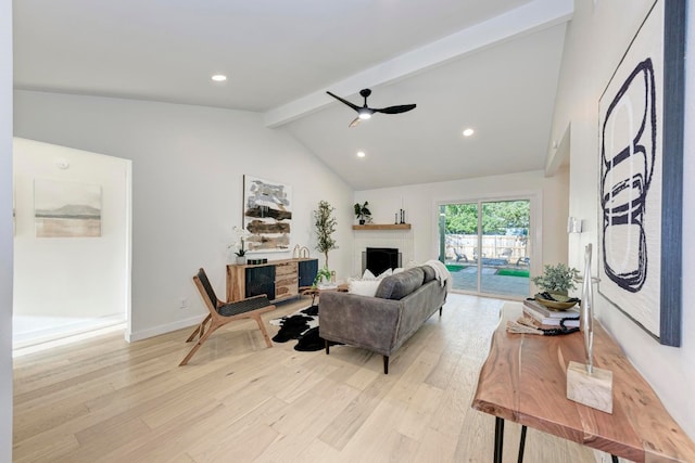 living room with beamed ceiling, ceiling fan, high vaulted ceiling, and light hardwood / wood-style flooring