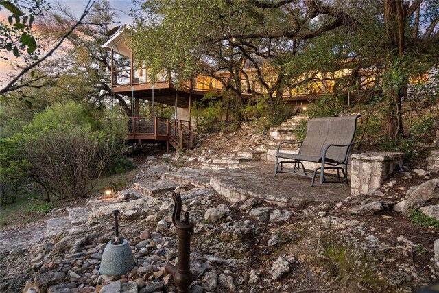 view of yard featuring a wooden deck