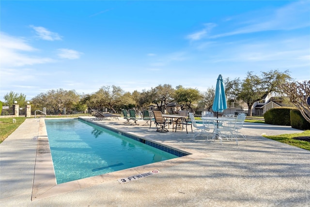 view of pool with a patio