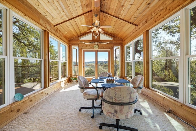 sunroom featuring wood ceiling, vaulted ceiling, and ceiling fan