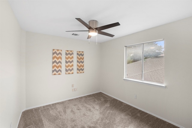 carpeted empty room with ceiling fan