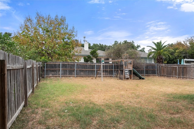 view of yard with a playground