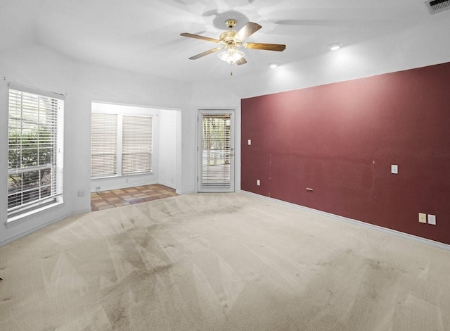 300 Delaware Springs Blvd, Burnet, TX 78611 - spare room featuring carpet, ceiling fan, and healthy amount of natural light