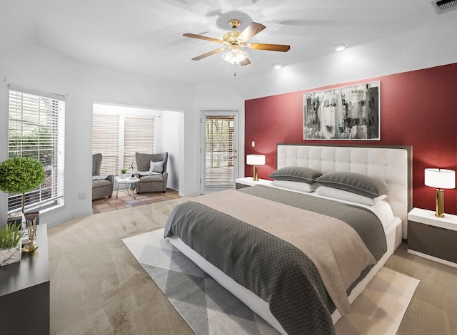 bedroom featuring ceiling fan and light colored carpet