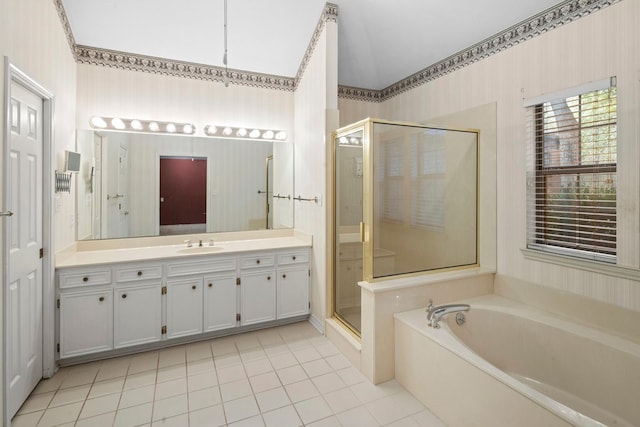 bathroom featuring vanity, plus walk in shower, and tile patterned flooring