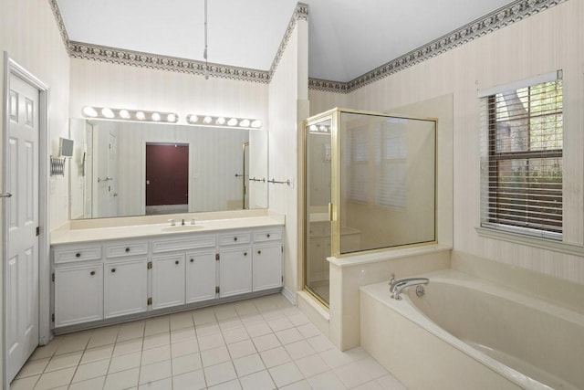300 Delaware Springs Blvd, Burnet, TX 78611 - bathroom with tile patterned flooring, a garden tub, vanity, and a stall shower