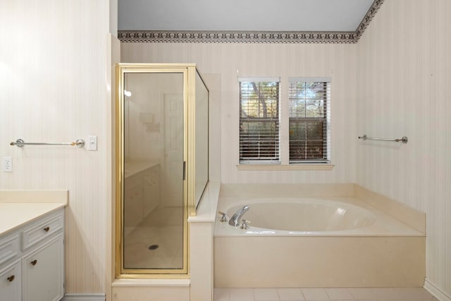 bathroom with vanity, shower with separate bathtub, and tile patterned flooring