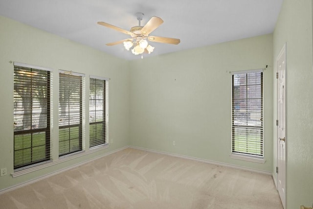 300 Delaware Springs Blvd, Burnet, TX 78611 - unfurnished room featuring plenty of natural light, carpet flooring, and a ceiling fan